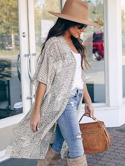 woman in fashionable hat and clothing in everyday setting